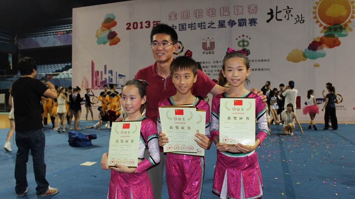 我校健美操社团在2013年全国啦啦操联赛（北京站）中再创佳绩